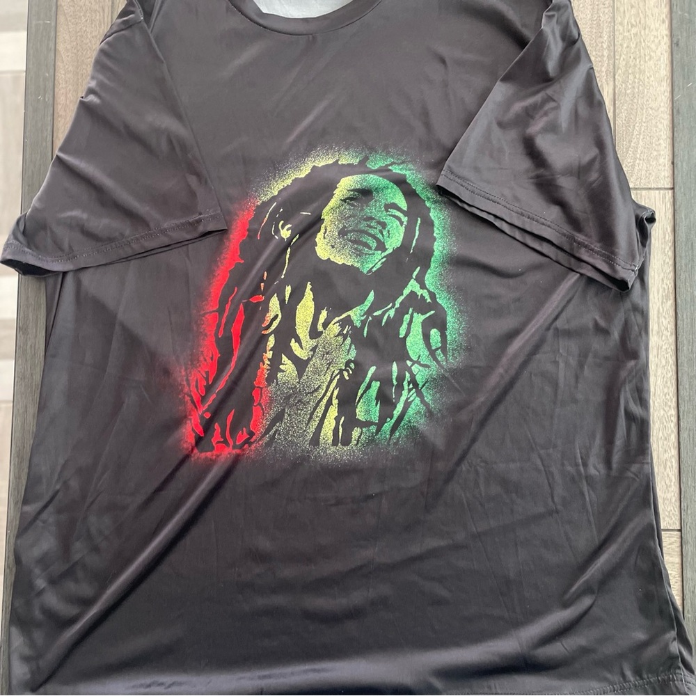 Black Graphic T-Shirt with Red and Green Accents